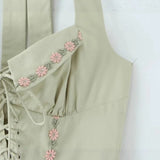 robe vert d'eau dos nu motifs fleurs